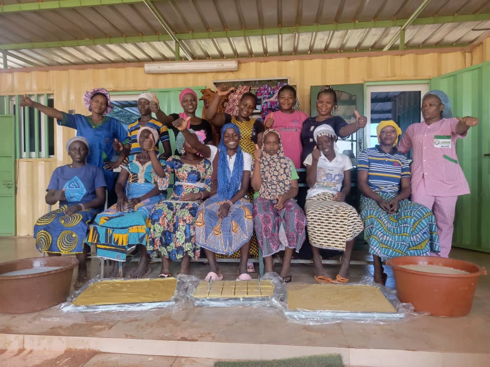 Survivors after a training session in soap making